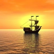 夕阳西下 海上帆船的